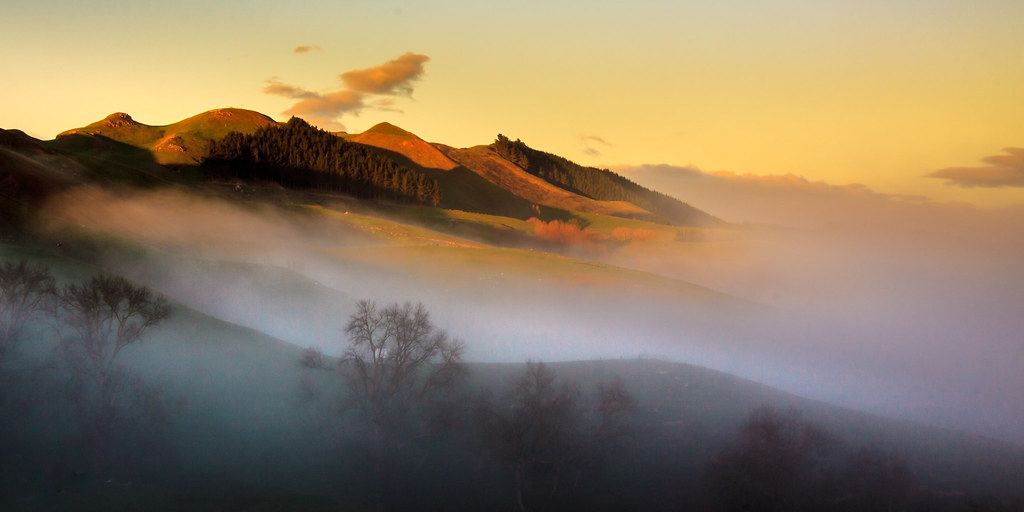 Taken a while ago while I was trying to take a sunrise photo of Te Mata Peak. I took a look behind me to check if I had put the car on the handbrake (because I forget such things when I am on a mission to take photos), and saw the mist climbing up the hills with the first bit a light on them. A great start to the morning.